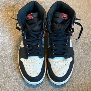 Black and White Air Jordan Ones with Red and Green details